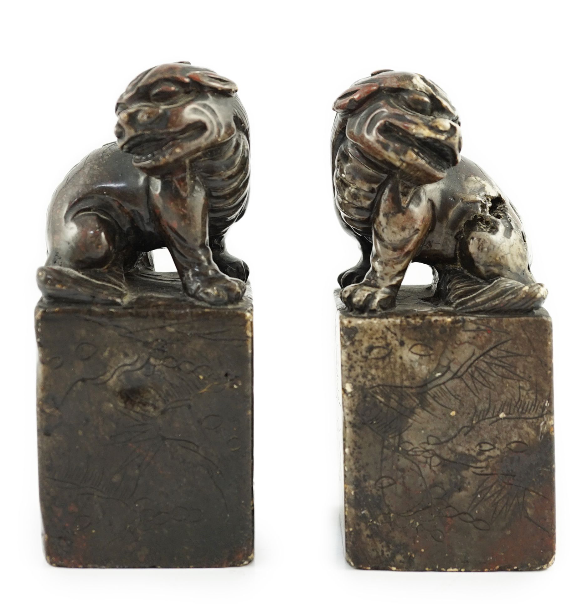 A pair of Chinese soapstone lion-dog seals, Qing dynasty